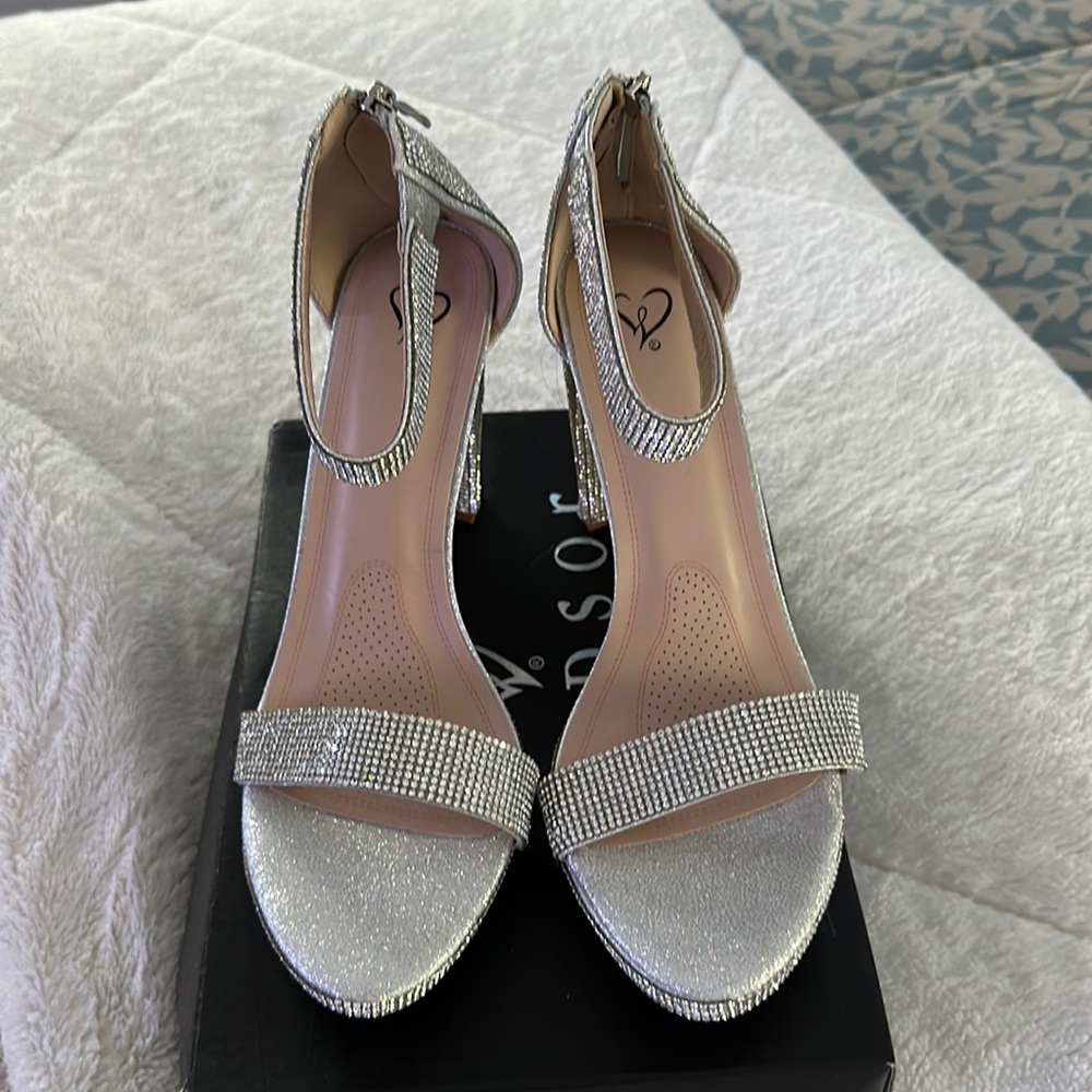 High heeled silver studded shoes